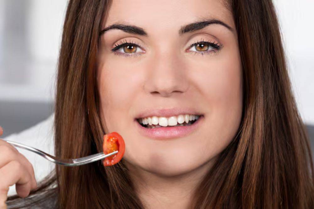 a pretty lady is smiling after getting dental treatment